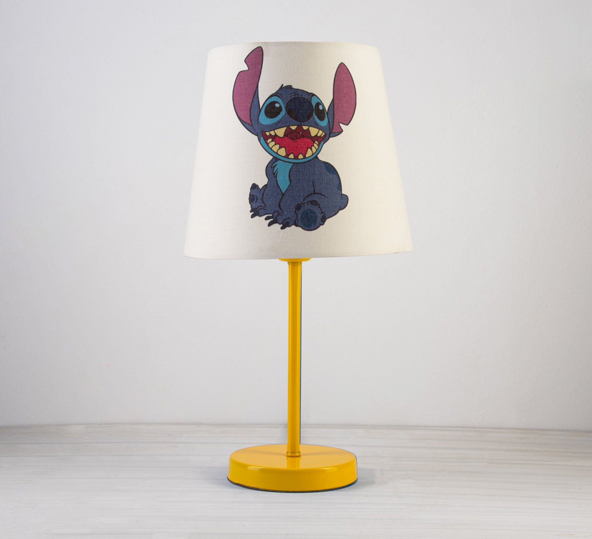 Stitch Lamp: A playful companion that brightens up your room with a golden base. - Vitrine Furniture - Lighting
