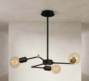 Three-light articulated pendant in black and gold - Vitrine Furniture - Ceiling lights