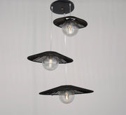Three - light black pendant lighting at different levels - Vitrine Furniture - Lighting