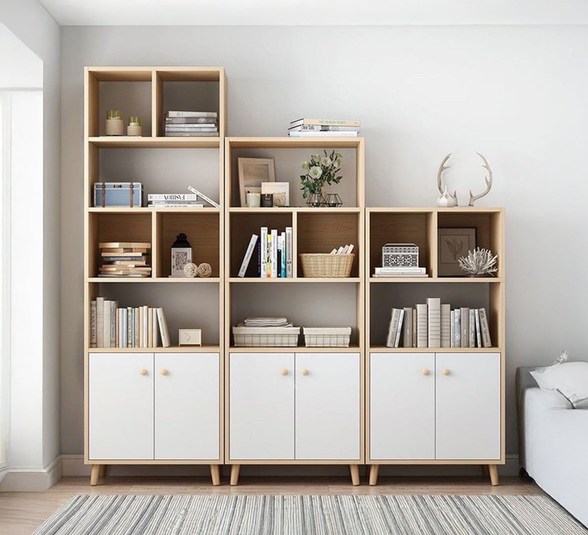 Three wooden storage units of varying heights with shelves and closed cabinets - Vitrine Furniture - Furniture