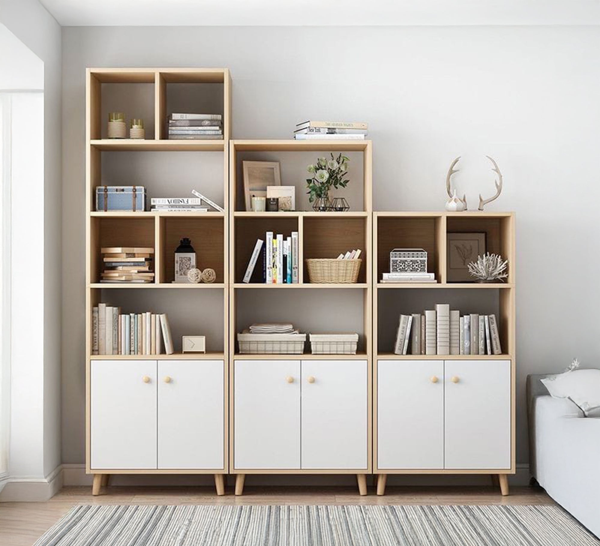Three wooden storage units of varying heights with shelves and closed cabinets - Vitrine Furniture - Furniture