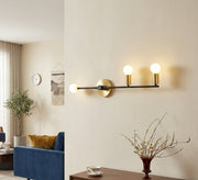 Triple-arm horizontal linear wall light in black and gold - Vitrine Furniture - Wall Sconce