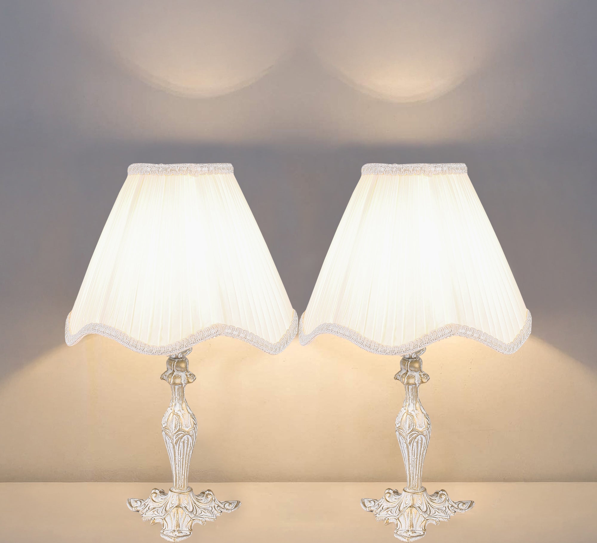Two antique - looking table lamps add a touch of elegance. - Vitrine Furniture - Lighting