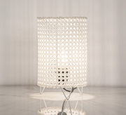 White cylindrical table lighting with a hollow grid pattern - Vitrine Furniture - Lighting