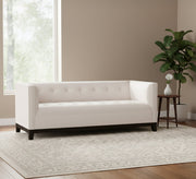 White sofa and black wooden legs - Vitrine Furniture - Living room Sofas